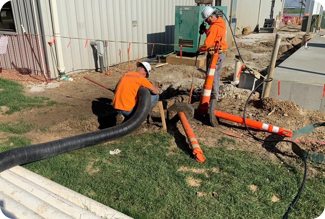 Men working on utility excavation